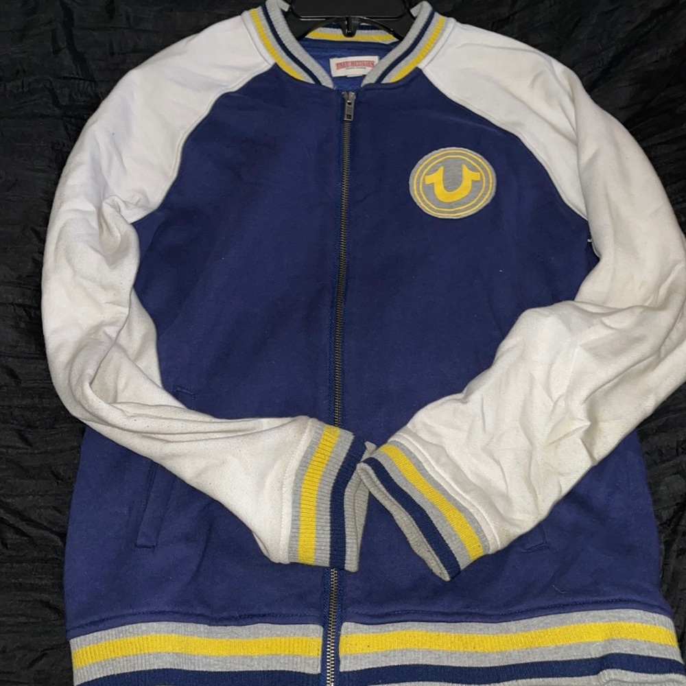 Used grey religion varsity jacket